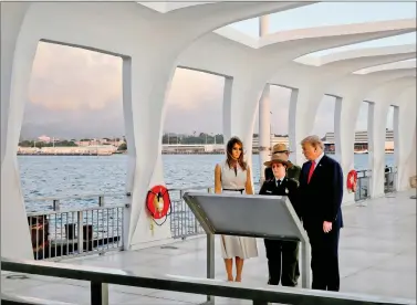  ?? REUTERS ?? US Park Service guides lead US President Donald Trump and first lady Melania Trump at the USS Arizona Memorial at Pearl Harbour in Honolulu, Hawaii, US on Friday.