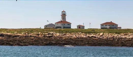  ??  ?? This lighthouse belongs to Canada, but the rest of this small island is disputed territory.