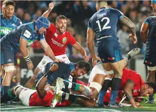  ??  ?? Early promise: Rhys Webb celebrates as CJ Stander is driven over