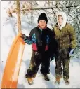  ?? Jule medders ?? Blake Silvers and Cheyenne Medders with a sled on the Chitwood Farm during the Blizzard of 1993.
