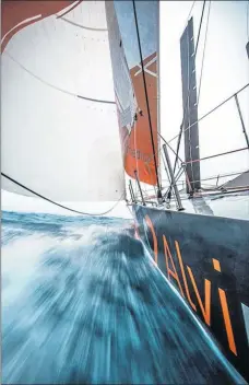  ??  ?? ON THE CREST OF A WAVE: Team Alvimedica’s yacht skims over the sea en route to Cape Town in South Africa on Day 19 of the first leg of the Volvo Ocean Race 2014-15, which started from Alicante in Spain on October 11 .