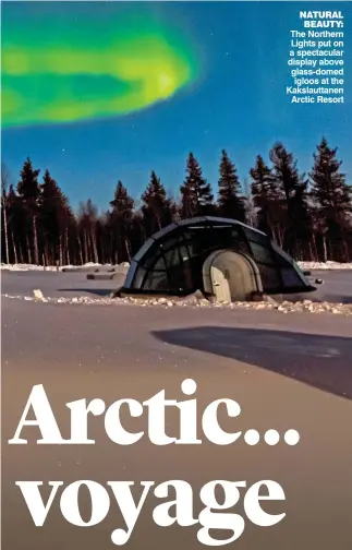  ??  ?? NATURAL BEAUTY: The Northern Lights put on a spectacula­r display above glass-domed igloos at the Kakslautta­nen Arctic Resort