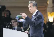  ?? PHOTOS BY PETR DAVID JOSEK, AP ?? China’s director of the Office of the Central Foreign Affairs Commission Wang Yi speaks at the 59th Munich Security Conference in Munich, Germany, on Saturday.