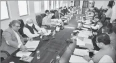  ??  ?? ISLAMABAD
Federal Minister for Finance and Revenue, Shaukat Tarin, chairing a meeting of the Economic Coordinati­on Committee (ECC) of the Cabinet at the Finance Division. -APP