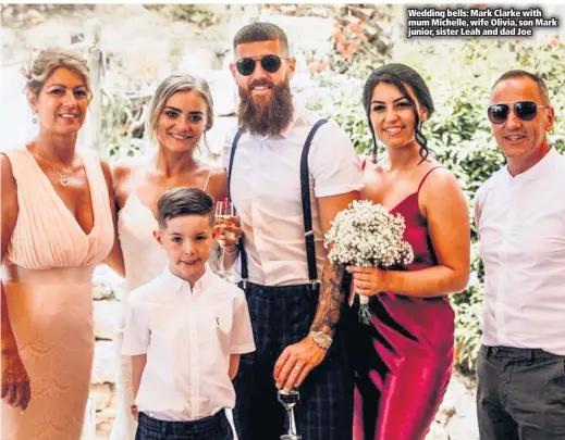  ??  ?? Wedding bells: Mark Clarke with mum Michelle, wife Olivia, son Mark junior, sister Leah and dad Joe