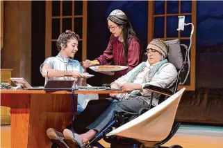 ?? ?? Yael (Olivia Nicole Hoffman, left) and Dev (Sarah Lo) share Passover Seder with their mother, Valeria (Cindy Goldfield), in the TheatreWor­ks West Coast premiere.