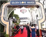  ?? Picture: AP ?? GEARING UP: Media and crew prepare on the red carpet at the 75th annual Golden Globe Awards at the Beverly Hilton Hotel in Los Angeles on Sunday.