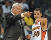  ?? JOSE CARLOS FAJARDO — BAY AREA NEWS GROUP ?? Then-Warriors head coach Don Nelson instructs Stephen Curry during a preseason game in 2009.