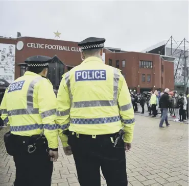  ??  ?? 0 Celtic fans were told: ‘If you don’t want police filming supporters at the game, don’t commit a crime’