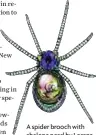  ??  ?? A spider brooch with abalone pearl by Lorenz Baumer.