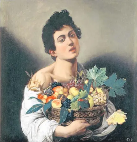  ?? Photograph­s by J. Paul Getty Trust ?? “BOY WITH a Basket of Fruit,” circa 1593-94, is one of three Caravaggio paintings on loan to the Getty Museum through Feb. 18.