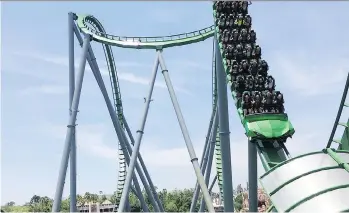  ?? SCOTT MAYEROWITZ/THE ASSOCIATED PRESS ?? The Incredible Hulk roller-coaster is a feature ride at Universal’s Islands of Adventure in Orlando, Fla. With a Universal Express pass, park visitors can skip long lines.