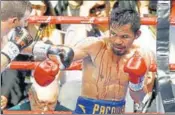  ?? AP ?? Manny Pacquiao (right) felt he was robbed of victory.