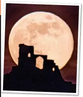  ??  ?? TREAT: The pink supermoon over Mow Cop Castle in the UK last year