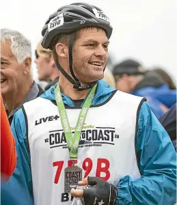  ?? JOSEPH JOHNSON/STUFF ?? Richie McCaw after finishing the Coast to Coast at the New Brighton Pier in Christchur­ch yesterday.