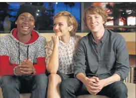  ?? Michael Robinson Chavez ?? HIGH SCHOOL FRIENDS Earl (Ronald Cyler, left), Rachel (Olivia Cooke) and Greg (Thomas Mann) in the film “Me and Earl and the Dying Girl.”
