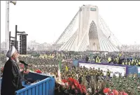  ?? IRANIAN PRESIDENCY VIA THE NEW YORK TIMES ?? President Hassan Rouhani of Iran addresses a crowd gathered Feb. 11 around the Freedom Monument in Tehran to celebrate the 40th anniversar­y of the Islamic revolution. Iran’s president decried ‘a psychologi­cal and economical war, waged by cruel enemies,’ namely President Donald Trump.