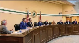  ?? ED RICHTER/STAFF ?? Lebanon’s new city council took office Wednesday, as newly elected members were sworn in. The council selected Mark Messer as mayor and Adam Mathews as vice mayor for the next two years. From left: councilman Mike Cope, councilman Joe Shafer, vice mayor Adam Mathews, city attorney Mark Yurick, mayor Mark Messer, city manager Scott Brunka, councilman Scott Norris, councilman Brad Lamoreaux and councilman Matt Sellers. Lebanon’s 2022 budget will exceed $100 million.