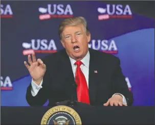  ?? The Associated Press ?? : President Donald Trump speaks during a roundtable discussion on tax reform at Cleveland Public Auditorium and Conference Center in Cleveland, Ohio on Saturday. Trump says he will announce his decision on whether to keep the U.S. in the Iran nuclear...