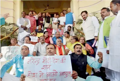  ?? PTI ?? BJP legislator­s stage a demonstrat­ion at the Bihar Assembly during its Budget Session in Patna on Wednesday. —