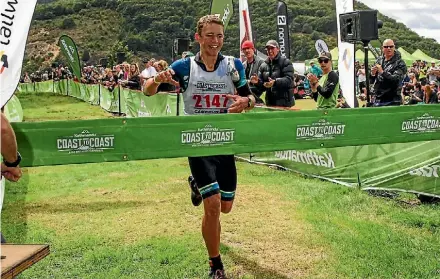  ?? MARATHON-PHOTOS.COM ?? Cameron Jones crosses the finish line after winning the Coast to Coast two-day event.