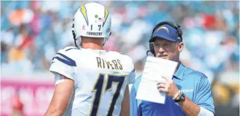  ?? MELINA VASTOLA, USA TODAY SPORTS ?? The Chargers’ Philip Rivers and Ken Whisenhunt, right, have a great working relationsh­ip.