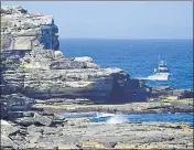  ?? ?? A fisheries boat patrols near the fatal shark attack site on little Bay in Sydney on Thursday.