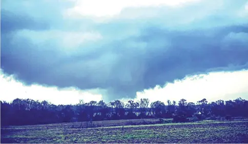  ??  ?? This handout image provided by Justin Merritt from his Instagram account shows a tornado in Dothan, Alabama. — AFP photo
