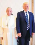  ?? L’OSSERVATOR­E ROMANO ?? Pope Francis and President Donald Trump before their private meeting Wednesday in the Vatican.