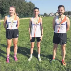  ??  ?? Ashleigh Byrne-O’Brien, Kevin Clancy and Richard O’Brien, who competed in the junior and senior race at Cólaiste track on September 20.