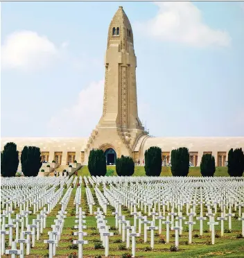  ?? RICK STEVES ?? The Douaumont Ossuary holds the remains of more than 130,000 unknown French and German soldiers from the First World War battle in Verdun, France.