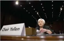  ?? JACQUELYN MARTIN — THE ASSOCIATED PRESS FILE ?? Federal Reserve Chair Janet Yellen prepares to testify on Capitol Hill in Washington, before the Joint Economic Committee.