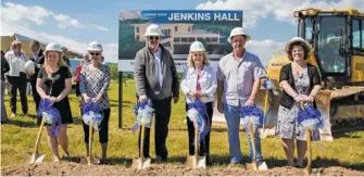  ??  ?? From the left, Allison Jenkins, her grandparen­ts Elta Rae and Russell Jenkins, LFCC President Kim Blosser, and Rodney and Karen Jenkins break ground for a permanent home for Lord Fairfax Community College behind the Wal-mart in Page County.