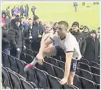  ??  ?? FLASHPOINT Dier climbs over the seats to reach the Tottenham fan accused of aiming abuse at his brother after the FA Cup defeat