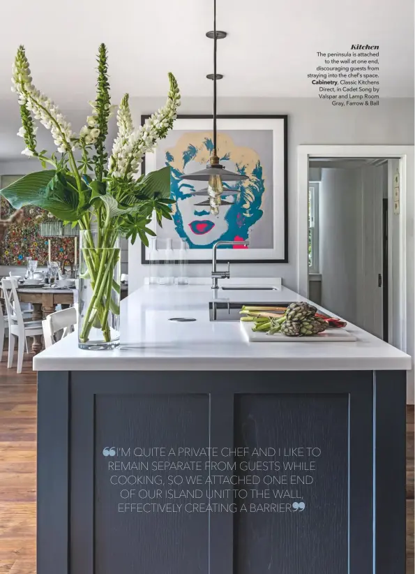  ??  ?? Kitchen
The peninsula is attached to the wall at one end, discouragi­ng guests from straying into the chef’s space. Cabinetry, Classic Kitchens Direct, in Cadet Song by Valspar and Lamp Room Gray, Farrow & Ball