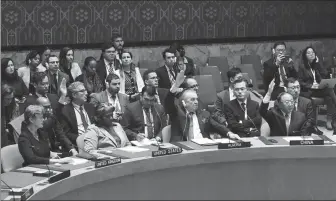  ?? MINLU ZHANG / CHINA DAILY ?? Above: Members of the United Nations Security Council vote on a Gaza resolution at the UN headquarte­rs in New York City on Monday. The resolution was passed with 14 out of 15 votes. The US abstained.