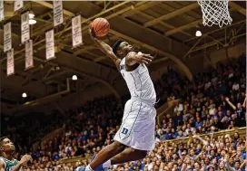  ?? GRANT HALVERSON/GETTY IMAGES ?? Duke freshman Zion Williamson, likely the No. 1 prospect on NBA teams’ draft boards already, dunks against Eastern Michigan last week.