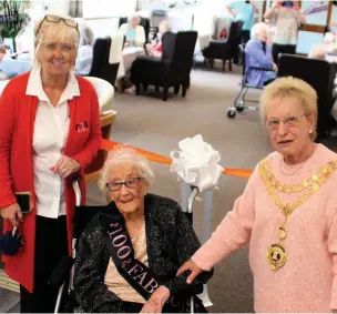  ??  ?? Ethel joins manager Clare Greenwood and Whitworth Mayor Councillor Maureen Jones at the official reopening of Sunnybank Day Centre.