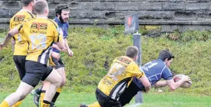  ??  ?? Wing Matthew Carter crosses in the corner for Tylorstown