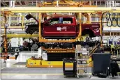  ?? THE NEW YORK TIMES ?? A battery-powered F-150Lightni­ng truck is on the production line in 2022.
