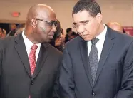  ?? CONTRIBUTE­D ?? Prime Minister Andrew Holness (right) listens to president of the Caribbean Broadcasti­ng Union (CBU), Gary Allen, at the opening ceremony for the CBU’s 49th Annual General Assembly at The Jamaica Pegasus hotel in New Kingston on Monday.