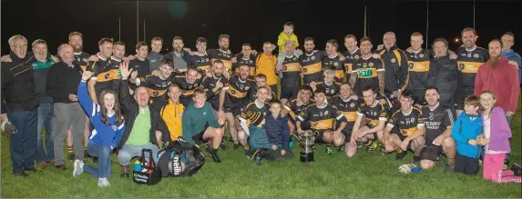  ?? Photo by Joe Hanley ?? Austin Stacks players and supporters celebrate after winning the Tommy Barrett Memorioal Cup at Caherslee on Friday evening.