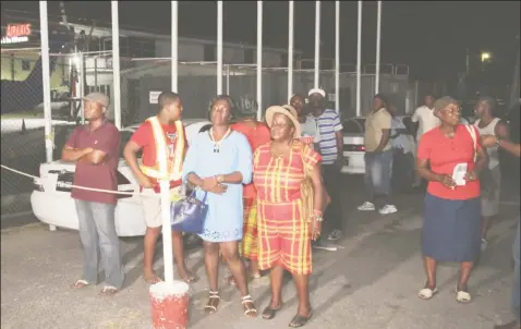  ??  ?? Guyanese family members at the Eugene F Correia Internatio­nal Airport waiting on their relatives who were evacuated from the Hurricane-hit British Virgin Islands.