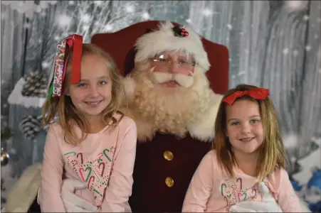  ?? ?? Lorelei and Stella McCrossen revealed their Christmas wish lists to Santa.