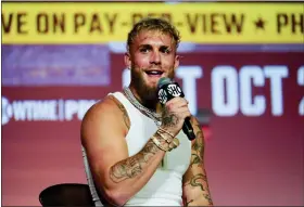  ?? AP PHOTO/ASHLEY LANDIS, FILE ?? FILE - Jake Paul speaks during a news conference Monday, Sept. 12, 2022, in Los Angeles. Jake Paul’s unorthodox career in boxing might just be about to get serious. The YouTube megastar influencer-turned-prizefight­er will be coming up against a recognized profession­al boxer for the first time Sunday when he takes on Tommy Fury.