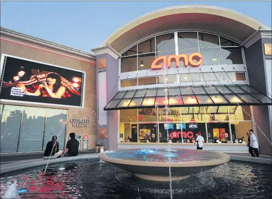  ?? Frederic J. Brown AFP/Getty Images ?? AMC, the world’s largest cinema firm, has rejected the idea of sharing revenue with MoviePass. It has called the service’s $9.95 monthly subscripti­on “unsustaina­ble.”