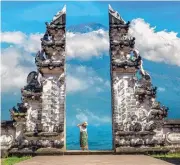  ?? ?? Swing over the water between coconut palms at Diamond Beach,
Nusa Penida, Bali, above; or discover the ancient gate at Pura Penataran Agung Lempuyang temple (Gates of Heaven), right.