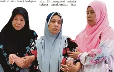  ??  ?? ISTERi mangsa, Rozanah Mohd Noor (tengah) dipapah ahli keluarga di Bilik Forensik Hospital Gua Musang.