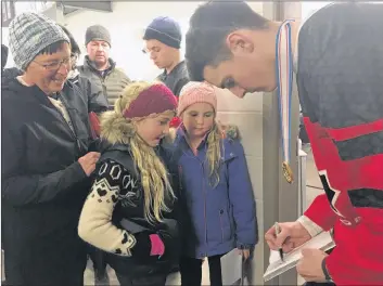  ?? ASHLEY THOMPSON ?? Gold-medal winning Team Canada forward Drake Batherson returned to his roots Jan. 7 to drop the puck at a Valley Wildcats game in Berwick. Batherson received a standing ovation, and kindly obliged when fans asked for autographs and photo ops.