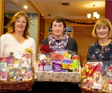  ??  ?? Pictured at the presentati­on for the Supervalu competitio­n in New Ross golf Club were: Marie T Wall (second), Mary Rose Ryan, winner, and Marguerite Sutton, Lady Captain, (third).